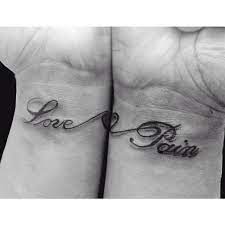 The fingerprint heart tattoos can be put on ankles or wrists or any part of the body that a couple may consider significant. Matching Wrist Tattoo Saying Love And Pain With A