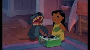 They adopt a dog, stitch which unknown to them, is actually a mutant alien accidentally landed on earth and has been designed to destroy everything it touches. Lilo Stitch 2002 Dvd Review Needcoffee Com