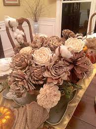With unflavored dental floss, secure the bottom of the flowers' stems to a hanger so that they hang upside down to dry. Hobby Lobby Sola Flower Wedding Bouquet Diy Forget Him Knot