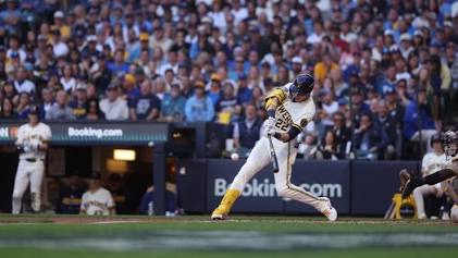 Christian Yelich sparked the Brewers' late rally, AI generated