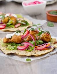 Fish tacos are a favorite quick and easy weeknight meal. Amritsari Fish Taco Fusion Food Fusion Food Food Recipes