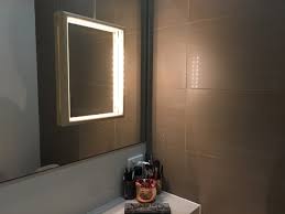 Vanity lights for mirror diy invitations. How To Add Light To Poorly Lit Bathroom Vanity Mirror Ikea Hackers