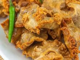 Deep-Fried Ruffled Fat From Pork Belly Or Pork Rinds, Or Other Meat Like  Chicken, Mutton Or Beef Also Called Chicharon Bulaklak Stock Photo - Alamy
