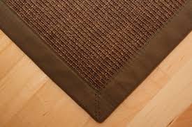 The ruckstuhl manufactory was founded in 1881 in the swiss city of langenthal. Sisal Teppich Manaus Dunkelbraun Mit Stoffbordure 064