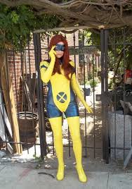 Young attractive stylish woman sitting in city street cafe in red coat, autumn style fashion trend, drinking coffee, wearing blue dress, high heeled shoes, legs in black net stockings, elegant lady. X Men Jean Grey Cosplay Costume Pvc Catsuits Cosercosplay Com