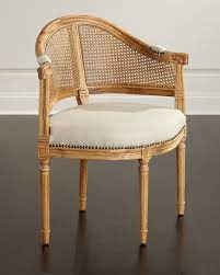 Foam padding lends comfort to the seat, while polyester blend upholstery in a solid hue wraps around to tie it all together. Cane Corner Accent Chair