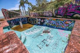 The Abandoned Brisbane Graffitied Swimming Pool Was A Unique Discovery There Where Many Graff Old Building Photography Buildings Photography Abandoned Places