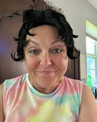 Going to be in the 4th of July parade in Arlington tomorrow! Husband is  driving our 52 Chevy convertible Betty Boop car and I'll be in the back  waving and melting! Trying