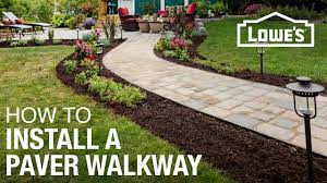 Watch to learn how to plan and install a paver walkway including preparing the base, block patterns and tips and tricks to make sure you get the project. How To Design And Build A Paver Walkway