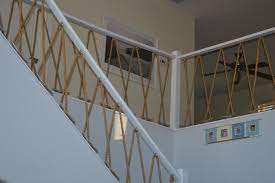 Nautical Stairway Rebulit The Bannisters With 5 8 Manila Rope 8 Boat Cleats And Eye Hooks Beach House Interior Design Loft Railing Beach House Interior