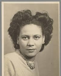 Florence Jackson pose in front of home