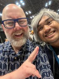 Cool reference to Batman: The Animated Series. Simon Trent was The Grey  Ghost who was voiced by Adam West!