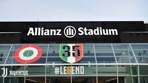 Various of officials outside stadium story: Call It Allianz Stadium Juventus