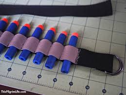Make this easy diy nerf gun storage rack out of pvc pipe to hang them all in one place! Diy Dart Belt This Pilgrim Life