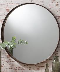 Choose a decorative wall mirror, framed mirror, or starburst mirror for the living room. 25 Circle Mirror Ideas Circle Mirror Mirror Mirror Wall