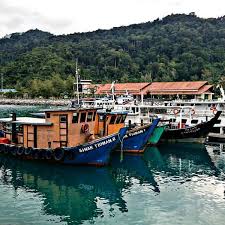Although it's not a small island when compared side by side with some of southeast asia's other islands, tioman holds plenty of appeal, especially for. Photos At Pusat Informasi Taman Laut Pulau Tioman