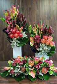 What to put in a vase with tropical flowers? 240 Best Tropical Arrangement Ideas In 2021 Tropical Flower Arrangements Flower Arrangements Floral Arrangements
