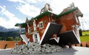 The attraction haus steht kopf at the address: Top 10 Weird And Unusual Tourist Attractions In Austria