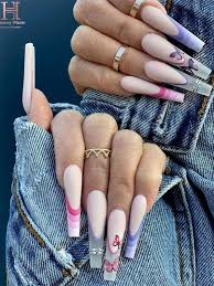 The acrylic coffin nails feature a square tapered end, which is bold and stylish. These Will Be The Most Popular Nail Art Designs Of 2021 Long Coffin French Tips With Butterflies