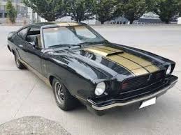 The 1974 mustang mach 1 offered styled steel wheels with chrome trim rings, remote control racing mirrors, and unique paint tape treatment on the newly designed hatchback body style. Ford Mustang Mach 1 King Cobra Ii Enginer 351 1974 Used The Parking