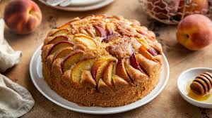 La torta soffice alle pesche è un dolce genuino fatto con solo ingredienti naturali, senza coloranti ne conservanti. Torta Alle Pesche E Miele Soffice E Gustosa Da Servire A Colazione