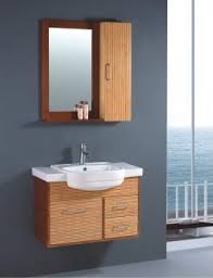 This bathroom vanity has got a cherry finish, solid wood construction, granite with quartz top, drawers and doors. China Bamboo Bathroom Vanity Bamboo Bathroom Furniture Bathroom Basin Cabinet Tb9007 China Bamboo Bathroom Vanity Bamboo Bathroom Furniture