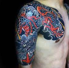 Orange And Black Japanese Dragon Half Sleeve And Chest Tattoo On Man Japanese Dragon Tattoo Dragon Tattoo Designs Dragon Tattoo