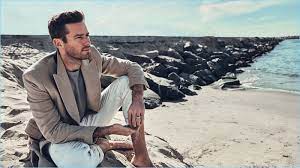 Armie Hammer Hits The Beach With Mr Porter Talks Chemistry With Timothee Chalamet Armie Hammer Mr Porter Acne Studios Jeans