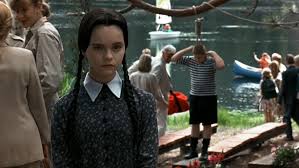 Addams Family Values (1993), a movie full of sight gags and one-liners, had  one I completely missed until today: Pugsley attempting to hang himself  shortly after arriving at Camp Chippewa. Its on