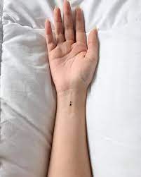 1 wrist tattoos for women; Small Wrist Tattoo Ideas Popsugar Beauty