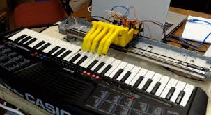 I want to learn how to play the piano. Piano Playing Robot With Arduino Robotic Gizmos