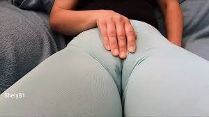 Woman with a Big Cameltoe Has Fun with a Dildo Through Her Leggings