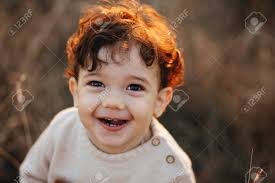 His hair expands the same regardless of what you do to it; Close Portrait Of A Sweet Smiling Toddler Baby Boy In Autumn Stock Photo Picture And Royalty Free Image Image 134044969