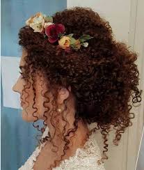 Braid the central section loosely and make a bun out of the braid. 40 Curly Hair Updos That Ll Be Trending In 2021