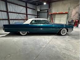Image result for Alpine Turquoise 1965 Cadillac