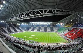 The stadium is a friendly bar/pizzeria with photos of old trafford, the stadio. Visiting Turin Juvefc Com