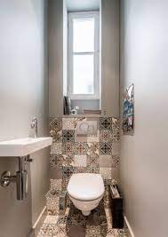 Zincirin gamba almaması için aralara konan bir eksene bağlı olarak dönen iki yarım bakladan oluşan kilit. Banyo Dekorasyonunda Desenli Fayanslar