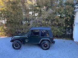 Image result for Brilliant Black 2005 Jeep