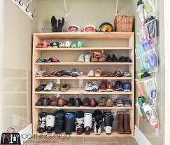 An industrial style diy shoe rack made out of copper piping. How To Make A Super Sized Shoe Rack On A Budget