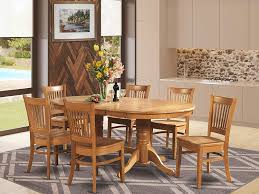 This shape can seat up to 10 people when fully extended, making it ideal for those who enjoy hosting large scale dinner parties at home or simply have a large family. Amazon Com 7 Pc Dining Room Set Dining Table With Leaf And 6 Dining Chairs Everything Else