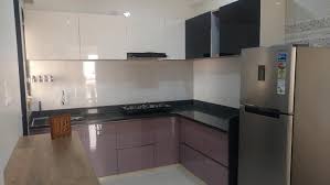 Modular Kitchen In Pu Finish With Back Painted Glass By Aashita Modular Kitchen Homify Kitchen Cabinets Pictures Kitchen Design Black Kitchen Cabinets