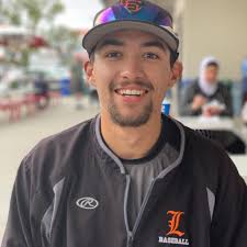 Looking for a professional pitcher to coach my 10 year old son. Willing to  travel