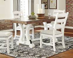 Bear in mind that smaller tables under 50 inches in length can typically seat up to four people. Valebeck Rectangular Dining Room Table D546 35 Tables Shapiro S Furniture Barn