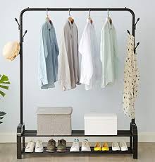 We love the wooden rail for hanging clothes. 8 Of The Best Clothes Rails 2021 For Extra Storage Space