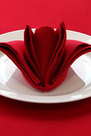 Fold the napkin's right edge about a third of the way vertically to reveal a small pocket; 6 Incredible Napkin Folding Ideas Beautiful Napkin Folding Napkin Design Napkin Folding