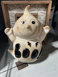 MY MANTLE THIS YEAR . i got that mirror recently from my local freecycle  group so im going with white and glowing for there this year.. I need to  find another place