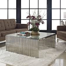 The contemporary style of this piece of furniture is sure to stand out in your living room arrangement. Modern Metallic Coffee Tables