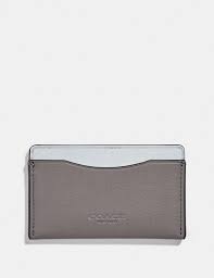 Check spelling or type a new query. Finished With Illuminating Reflective Leather Detailing This Smooth Leather Case Keeps All Your Cards Organized In A Simple Streamlined Style The Generous Main Compartment Holds Up To 8 Cards While The Two External Slots Keep The Cards You Reach For Most
