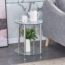 The round smoked glass top is nestled into a beautiful sculptural base that features large dripping metal that create both embellishments and the legs. Bonchoice 2 Tier Round End Table Clear Glass Side Coffee Tables With Stainless Steel Legs Storage Shelf For Living Room Display Table For Small Space 40 40 50cm Clear Amazon Co Uk Kitchen Home