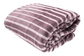 We may earn commission on some of the items you choose to buy. Elle Decor Throw